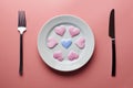 Hearts on plate. Woman and men love flirt. Choice among different sex partners. New girlfriend or boyfriend. Promiscuity and Royalty Free Stock Photo