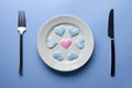 Hearts on plate. Woman and men love flirt. Choice among different sex partners. New girlfriend or boyfriend. Promiscuity and Royalty Free Stock Photo