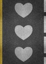 Hearts on road surface