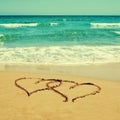 Hearts in the sand of a beach