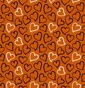 Hearts seamless pattern in black and white colors on the orange background. Royalty Free Stock Photo