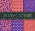 Hearts seamless patterns set in trendy bright violet and orange colors. Cute flat cartoon style vector illustration. Royalty Free Stock Photo