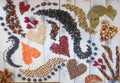 Hearts and swirls made with beans, seeds and spices Royalty Free Stock Photo