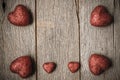 Hearts on Vintage Wood Background