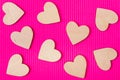 Hearts of wood on the pink corrugated background. Valentine& x27;s da Royalty Free Stock Photo