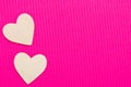 Hearts of wood on the pink corrugated background. Valentine's day background Royalty Free Stock Photo