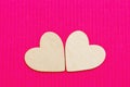 Hearts of wood on the pink corrugated background. Valentine& x27;s da Royalty Free Stock Photo