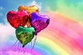 Heartshaped Balloons Floating In The Air With A Colorful Rainbow Backdrop