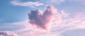 A Heartshaped Cloud Formation In A Pastelcolored Sky With The Caption Love In The Air Royalty Free Stock Photo