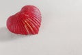 Heartshaped shell on sandy beach, Closeup of shell expressing affection and celebration mood, Intimate photograph capturing Royalty Free Stock Photo