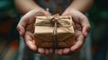 Generosity in Action: Hands Giving a Thoughtful Gift to Spread Joy and Kindness