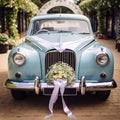 Timeless Romance: Classic Wedding Car with \'Just Married\' Plate and Flower Decorations Royalty Free Stock Photo