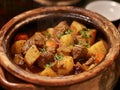 Hearty Beef Stew in a rustic clay pot. Royalty Free Stock Photo
