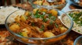 Hearty beef stew in a wooden bowl with potatoes and garnished with parsley Royalty Free Stock Photo