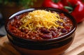 Hearty Bowl of Chili with Shredded Cheese on Top