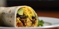 Hearty Breakfast Burrito with Scrambled Eggs, Veggies, and Beans Royalty Free Stock Photo