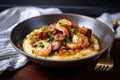 Hearty and Delicious Shrimp and Grits with a Sausage and Bacon Twist