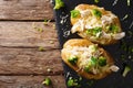 Hearty hot baked potato with broccoli, chicken, onion and cheese