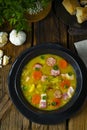 Hearty rustic pea soup with bacon and sausage Royalty Free Stock Photo