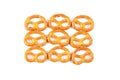 Hearty salty pretzels as a snack on a white background