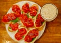 Hearty snack with different kinds of spreads on farmhouse bread served with a fresh yeast wheat beer