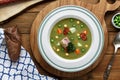 Hearty traditional Dutch pea soup with smoked sausage, rye bread and bacon. Or: `erwtensoep met rookworst, roggebrood en Royalty Free Stock Photo