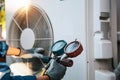 Heat and Air Conditioning, HVAC system service technician using measuring manifold gauge checking refrigerant and filling Royalty Free Stock Photo