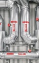Heat and cooling pipe system in a district heating plant Royalty Free Stock Photo
