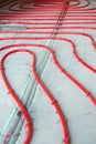 Heat floor instalation. Repair, engineering. Underfloor heating technology. Construction work. Renovation Royalty Free Stock Photo