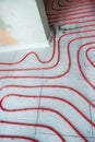 Heat floor instalation. Repair, engineering. Underfloor heating technology. Construction work, repair Royalty Free Stock Photo