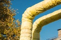 Heat insulation of hot water pipes in autumn Royalty Free Stock Photo
