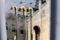 Heat pipes from which hot steam comes out on the roof of the building