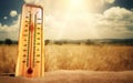 Heat, thermometer shows the temperature is hot in the sky, Summer Royalty Free Stock Photo