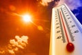 Heat, thermometer shows the temperature is hot in the sky, Summer Royalty Free Stock Photo