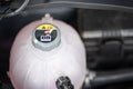 Heat warning symbol on car engine coolant radiator. Royalty Free Stock Photo