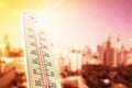 Heat wave in the city thermometer shows in summer