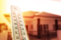 Heat wave in the house thermometer shows in summer Royalty Free Stock Photo