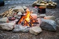 heated stones around a makeshift campsite