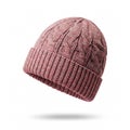 Heathered pink knitted beanie with a textured pattern and a ribbed brim Royalty Free Stock Photo
