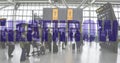 Heathrow Airport - Terminal 5 - travellers looking for flight information Royalty Free Stock Photo