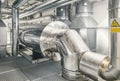 Heating and cooling pipe system with exhaust silencer in a heating plant Royalty Free Stock Photo