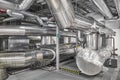 Heating and cooling pipe system with exhaust silencer in a heating plant Royalty Free Stock Photo