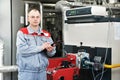 Heating engineer in boiler room Royalty Free Stock Photo