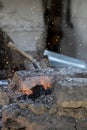 Heating the fire from an old style blacksmith Royalty Free Stock Photo