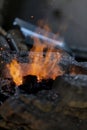 Heating the fire from an old style blacksmith Royalty Free Stock Photo
