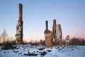 Heating furnaces on the ashes of the burned-down two-storeyed house in the January evening. Lenin Royalty Free Stock Photo