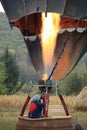 Heating the hot air balloon before lifting off Royalty Free Stock Photo