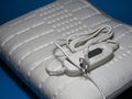 Heating pad with temperature and time control options Royalty Free Stock Photo