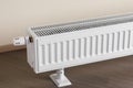 Heating radiator with thermostatic knob in the living room