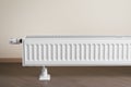 Heating radiator with thermostatic knob in the living room